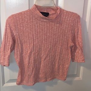 Selling a coral pink crop top shirt